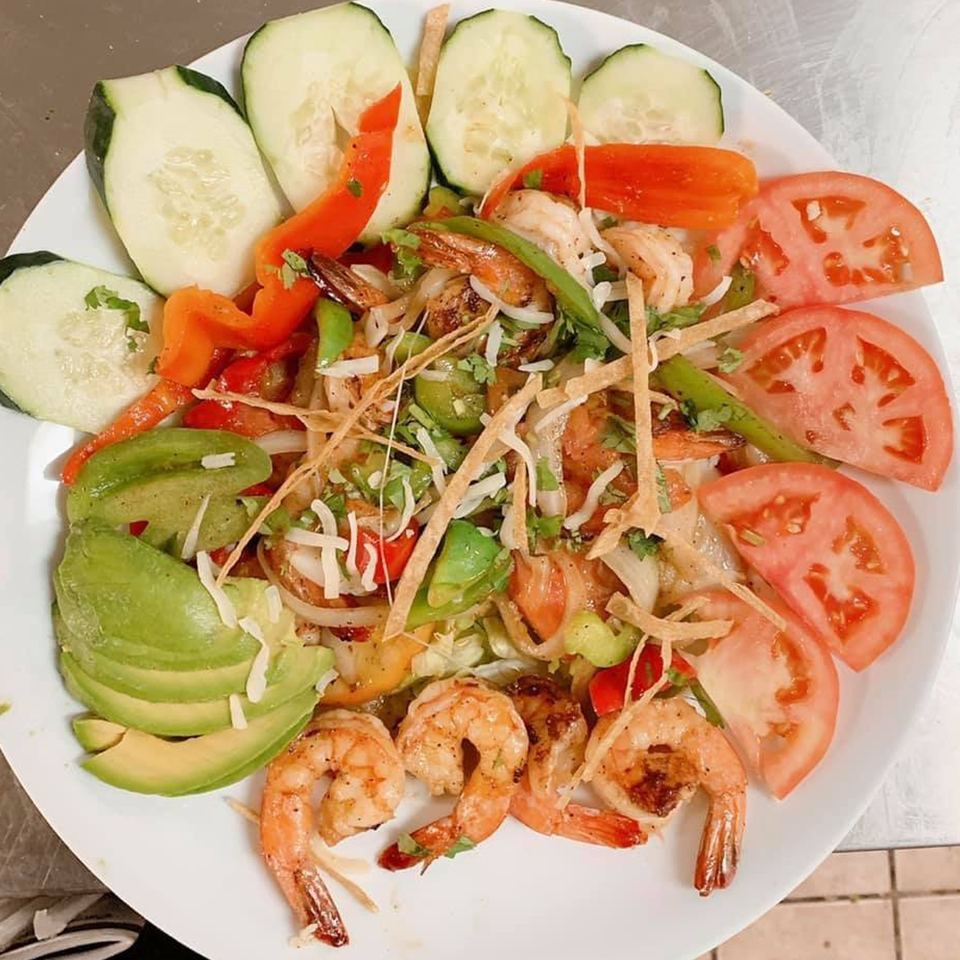 Mi Favorito Mexican Restaurant's shrimp salad with avocado, cucumber, tomatoes, and tortilla strips.